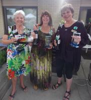 The ladies with their recognition awards